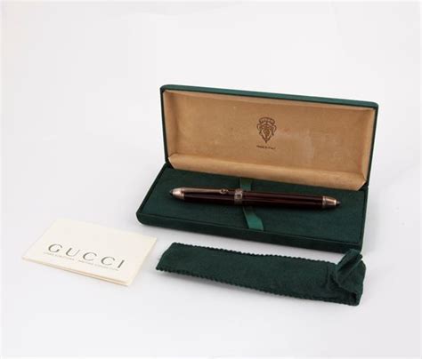 penna gucci legno e argento|Gucci .